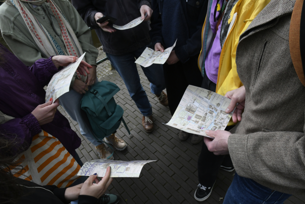 participants looking at each others maps and sharing their thoughts