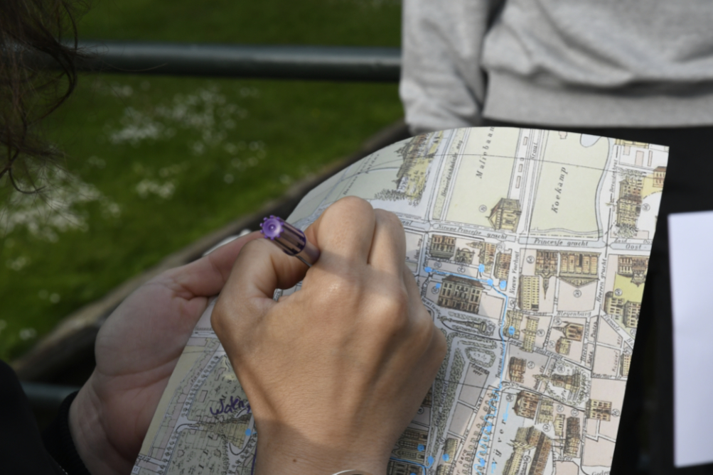 close-up of someone drawing on the map
