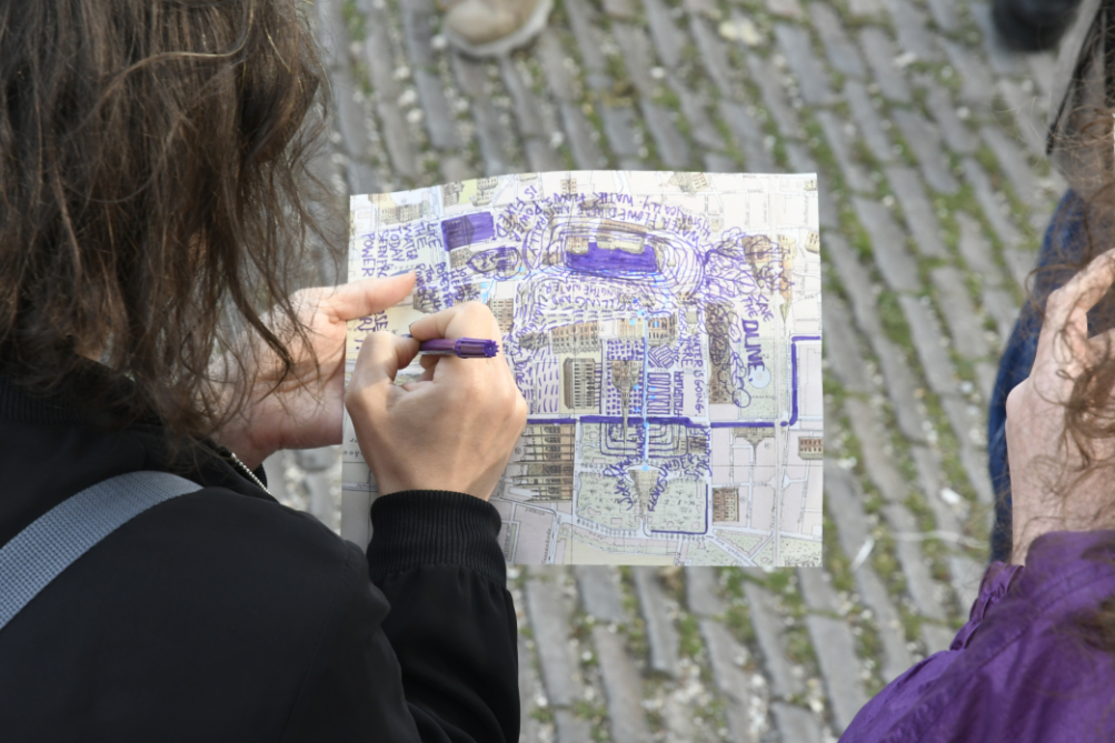 close-up of someone drawing on the map